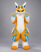 CHIYAN — a one-of-one kemono fullsuit by Fulu Fursuits in orange and white with cyan markings, four blue horns, blue eyes and a broad finned tail
