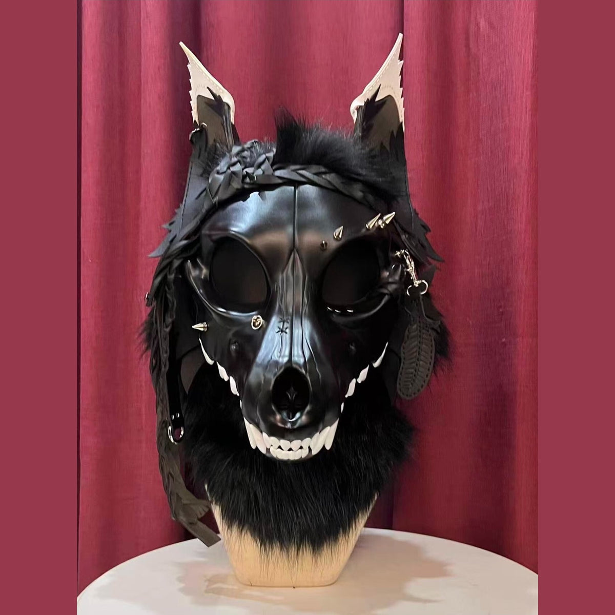 CURFEW — a one-of-one skulldog fursuit head by Fulu Fursuits: a black resin wolf skull with white teeth and an articulated jaw, leather ears and braided leather falls