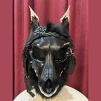 CURFEW — a one-of-one skulldog fursuit head by Fulu Fursuits: a black resin wolf skull with white teeth and an articulated jaw, leather ears and braided leather falls