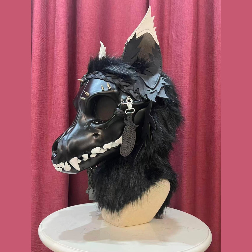 CURFEW — a one-of-one skulldog fursuit head by Fulu Fursuits: a black resin wolf skull with white teeth and an articulated jaw, leather ears and braided leather falls
