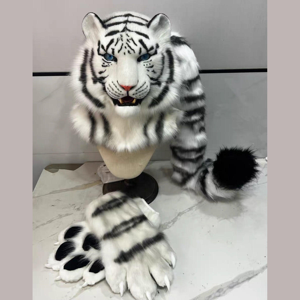 GLACIER — a one-of-one realistic white tiger partial by Fulu Fursuits: head, handpaws and tail in white faux fur with black stripes and blue eyes