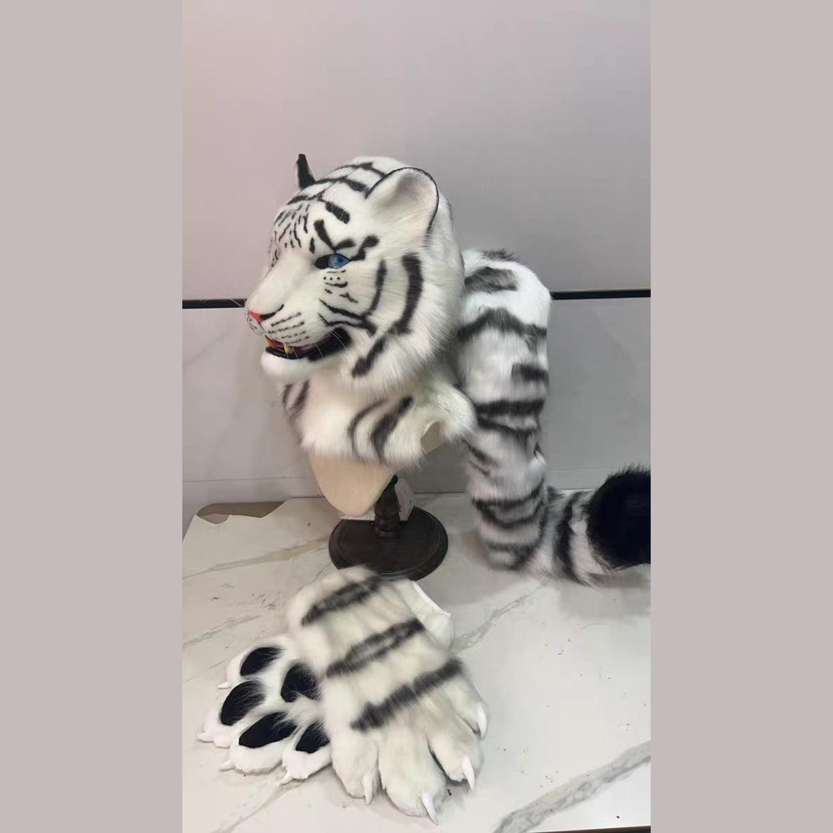 GLACIER — a one-of-one realistic white tiger partial by Fulu Fursuits: head, handpaws and tail in white faux fur with black stripes and blue eyes