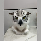 HUSH — a one-of-one realistic owl fursuit head by Fulu Fursuits, white with black flecking, yellow eyes and a black beak