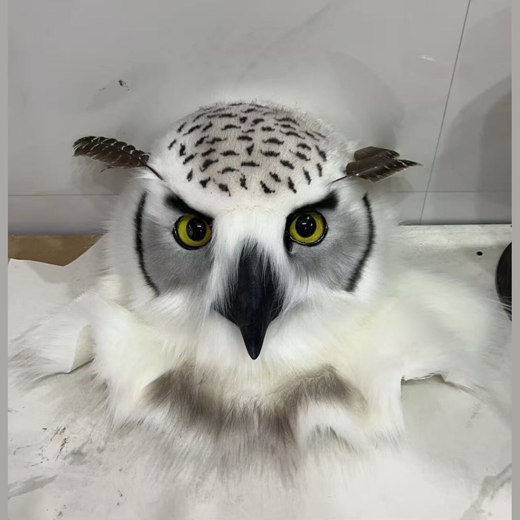 HUSH — a one-of-one realistic owl fursuit head by Fulu Fursuits, white with black flecking, yellow eyes and a black beak