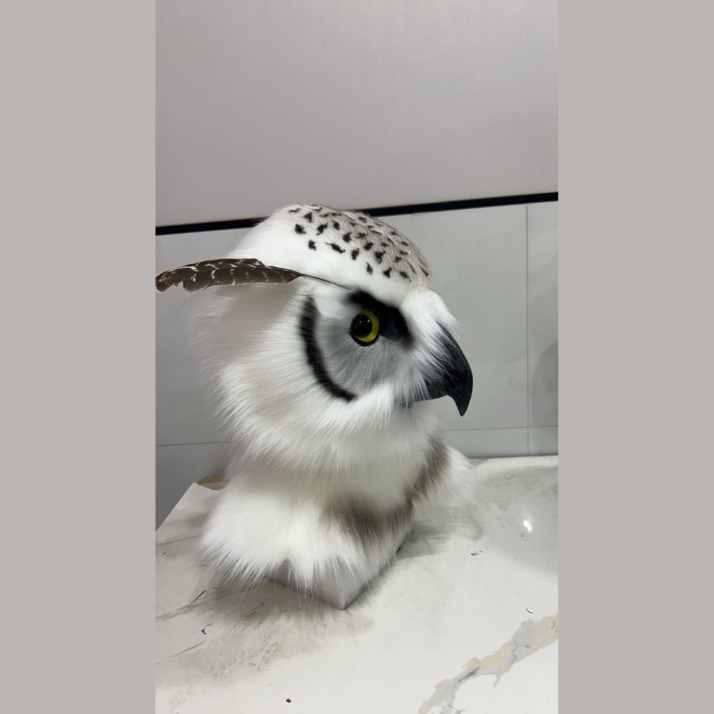 HUSH — a one-of-one realistic owl fursuit head by Fulu Fursuits, white with black flecking, yellow eyes and a black beak