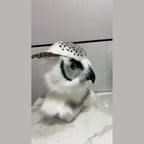 HUSH — a one-of-one realistic owl fursuit head by Fulu Fursuits, white with black flecking, yellow eyes and a black beak