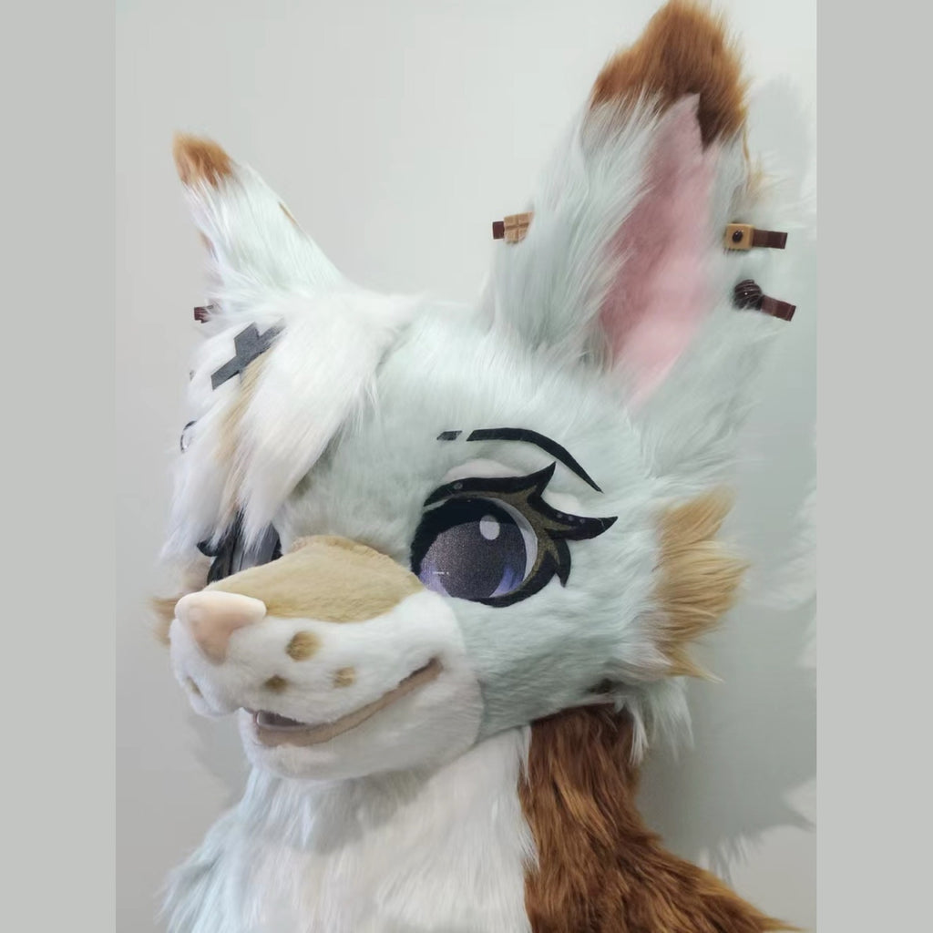 LATTE — a one-of-one toony fursuit head by Fulu Fursuits in mint white and caramel, with tall pink-lined ears and large stylised eyes
